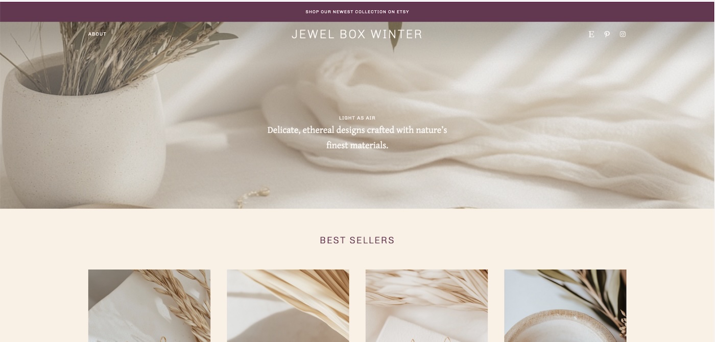 a screenshot of a website for a jewelry company with a creamy chai background and purple accents